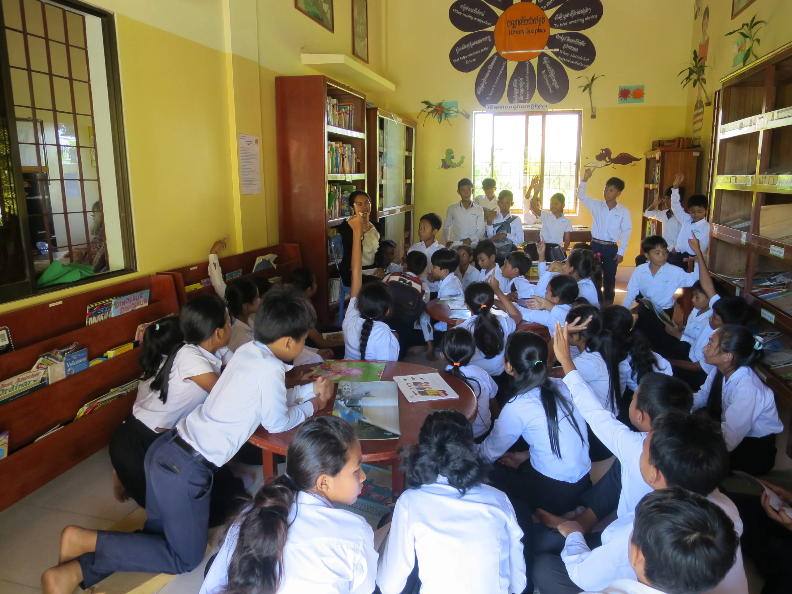 Teachers and children at the school